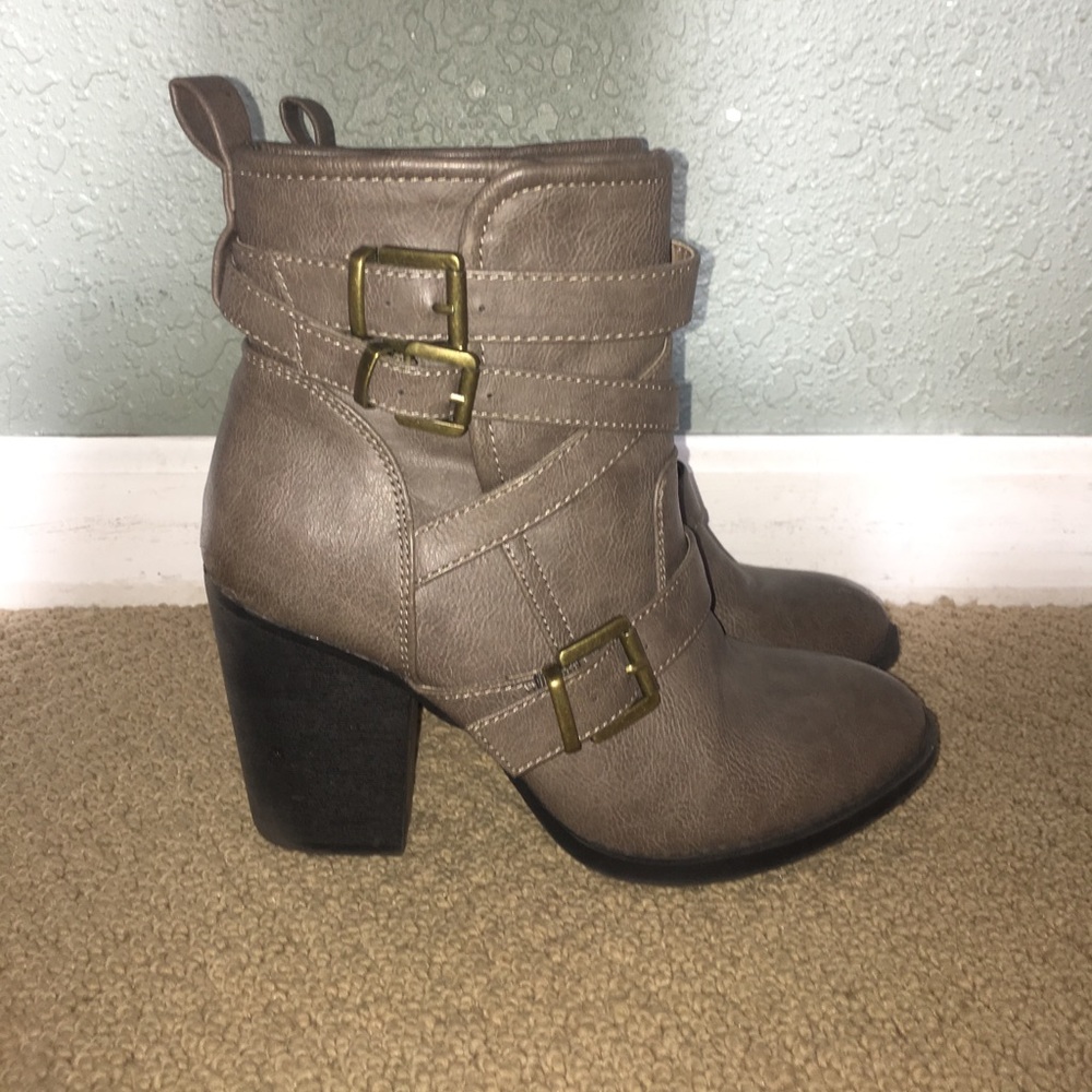 High heeled strappy boots