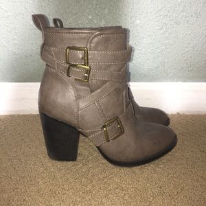 High heeled strappy boots