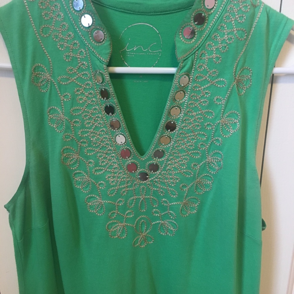 Sleeveless green top