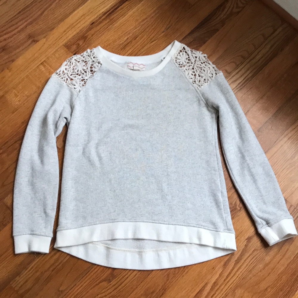 Cute sweatshirt with crocheted sleeve caps!