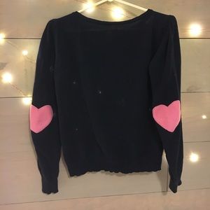 Navy sweater with pink heart elbow patches