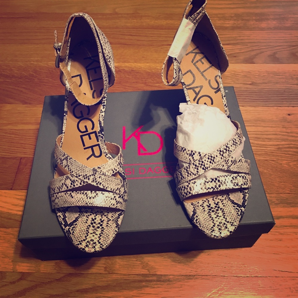 Never worn snakeskin wedges with ankle strap