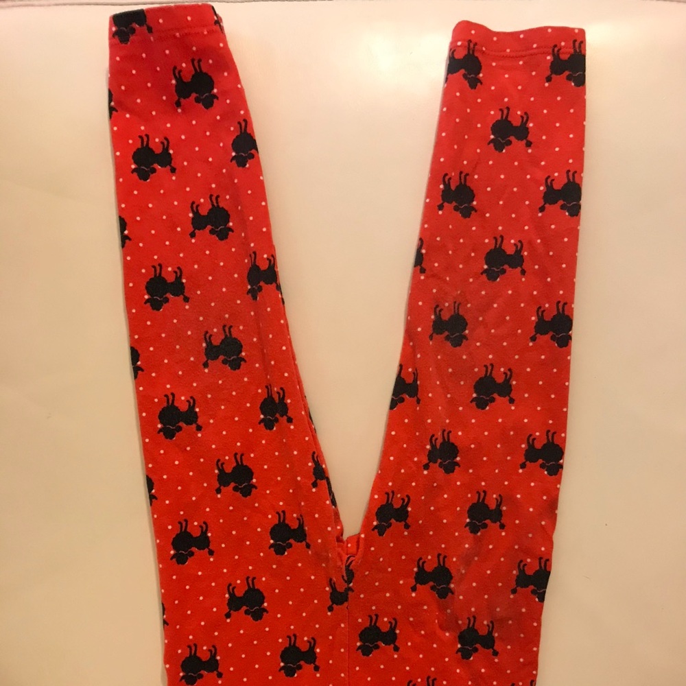 Red leggings black poodles