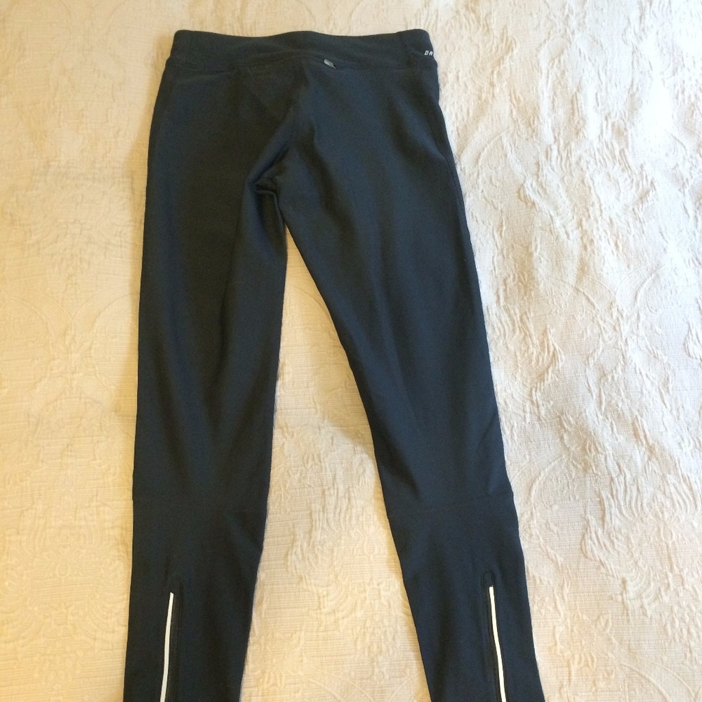 Nike Dry Fit leggings in black with side zip