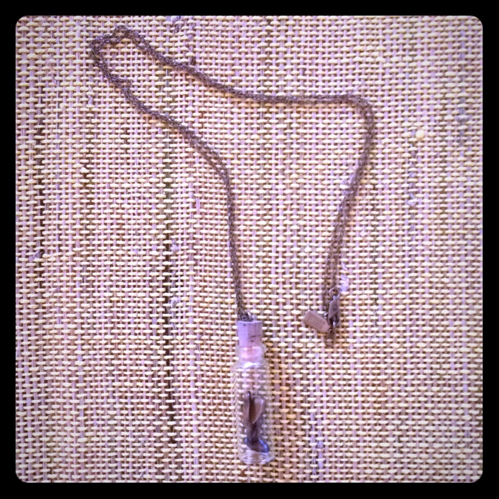 Glass vial necklace by Erica Weiner