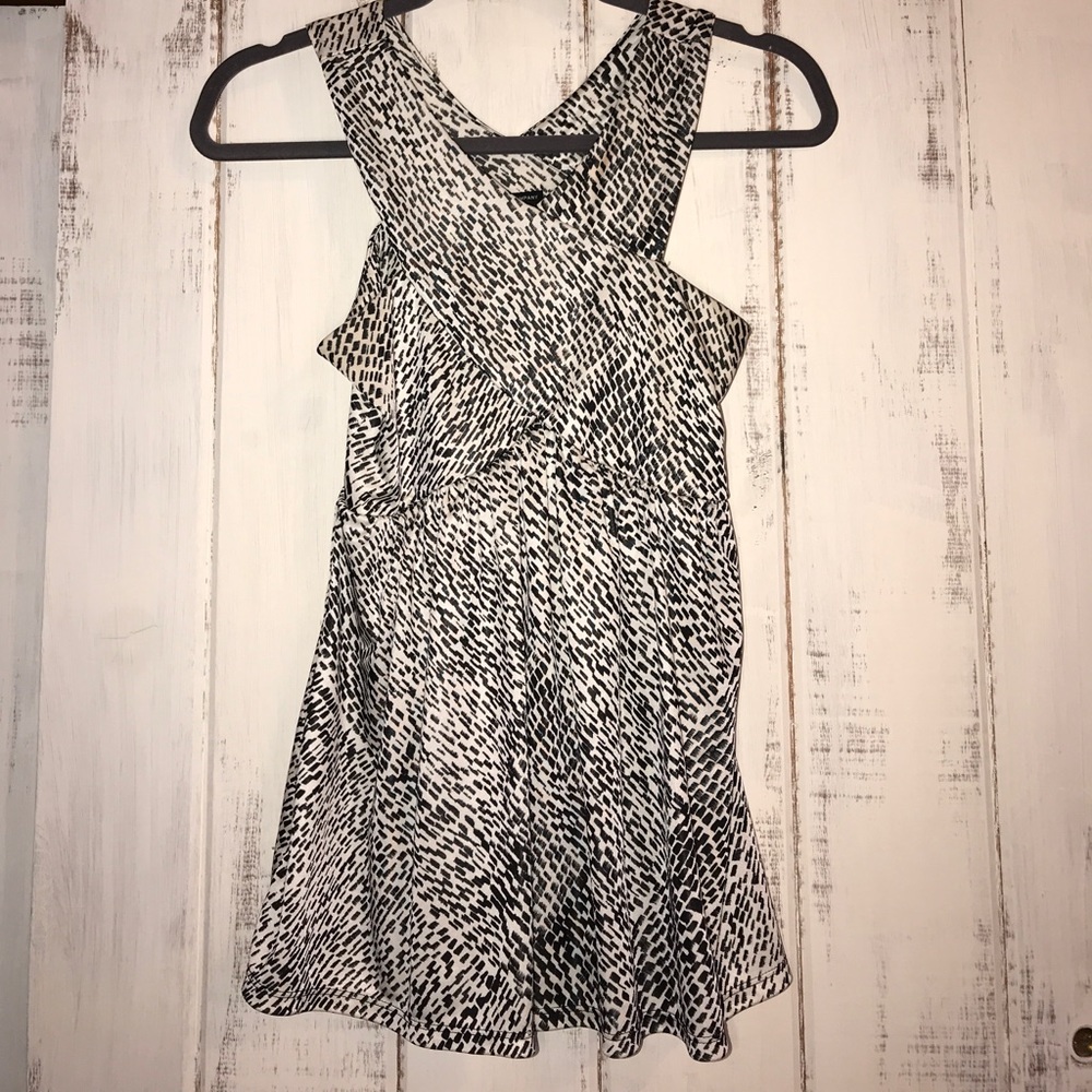Flowy and dressy black and white sleeveless top