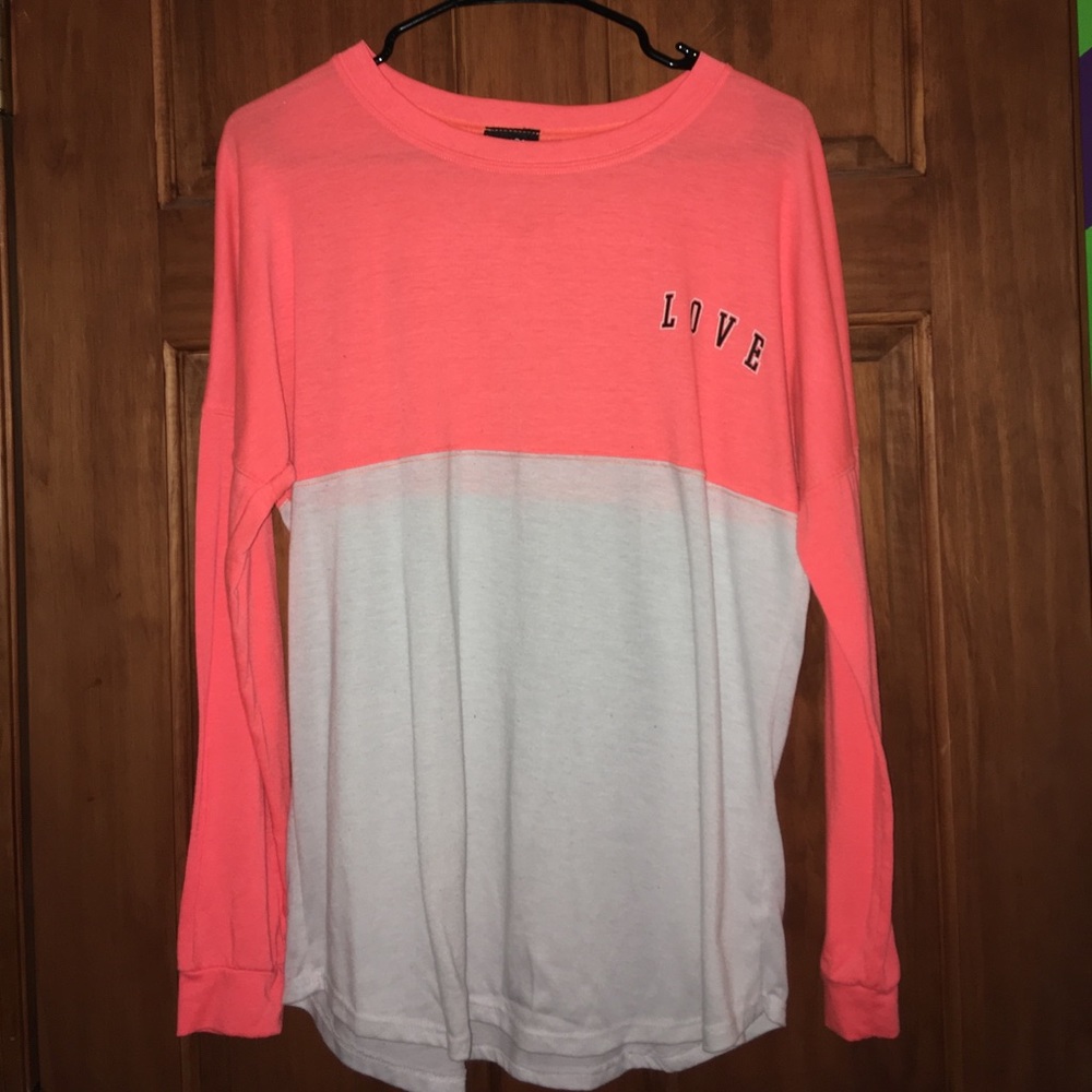 Long sleeve pink love jersey shirt.