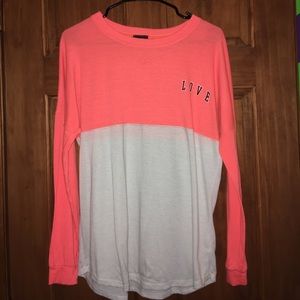 Long sleeve pink love jersey shirt.