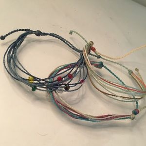 Three Puravida bracelets