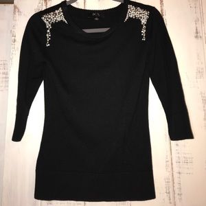 Black sweater w 3/4 length sleeves, pearl detail