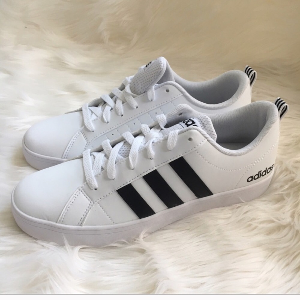 White adidas black stripe