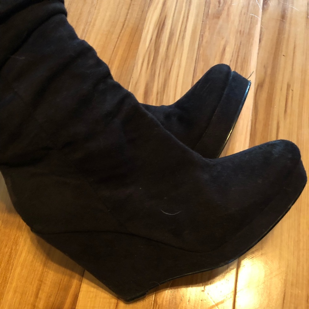Black slouchy over the knee wedge boots