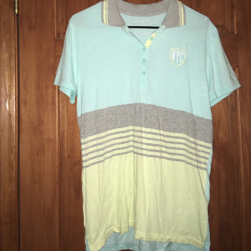 Light blue, green, and grey polo shirt
