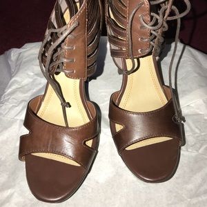 Brown leather 4” heels.