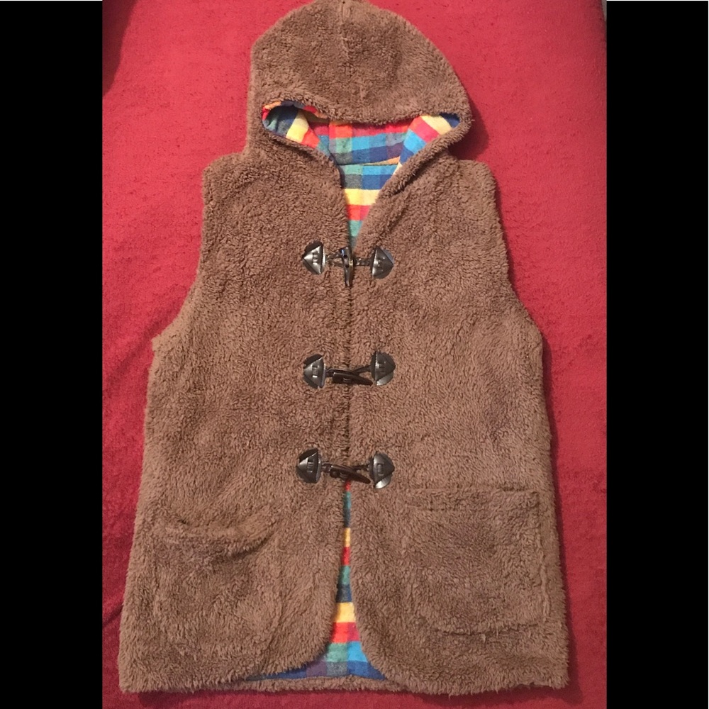Furry brown vest.