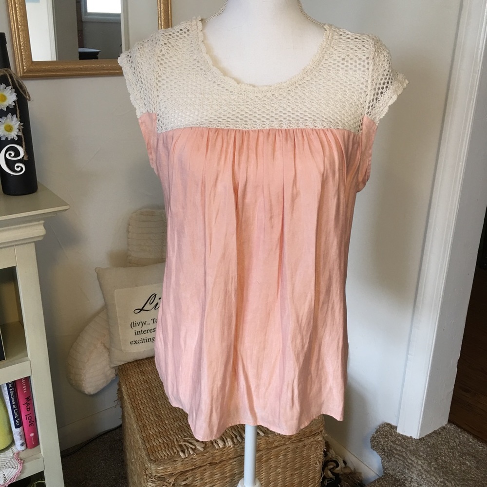 Pink/peach colored
