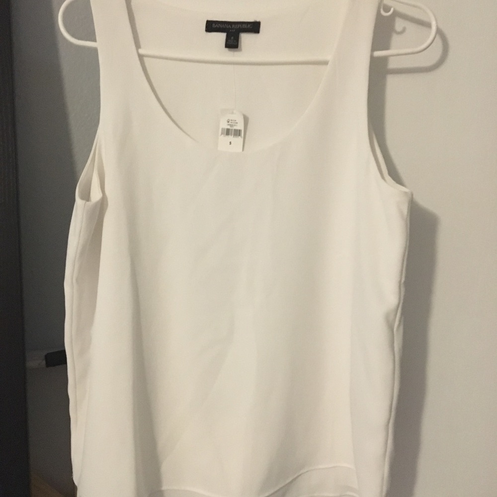 New white blouse with tags.
