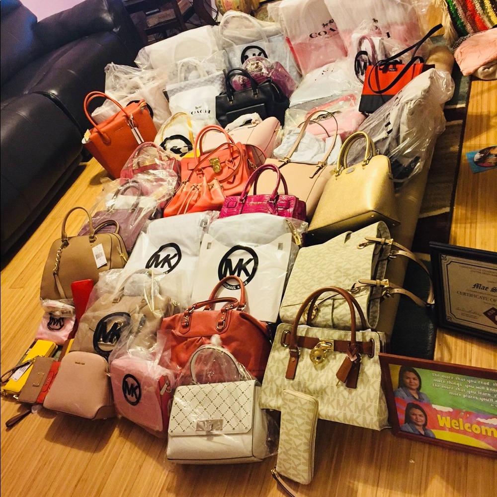 Collection of authentic MKs and Coachs purses.