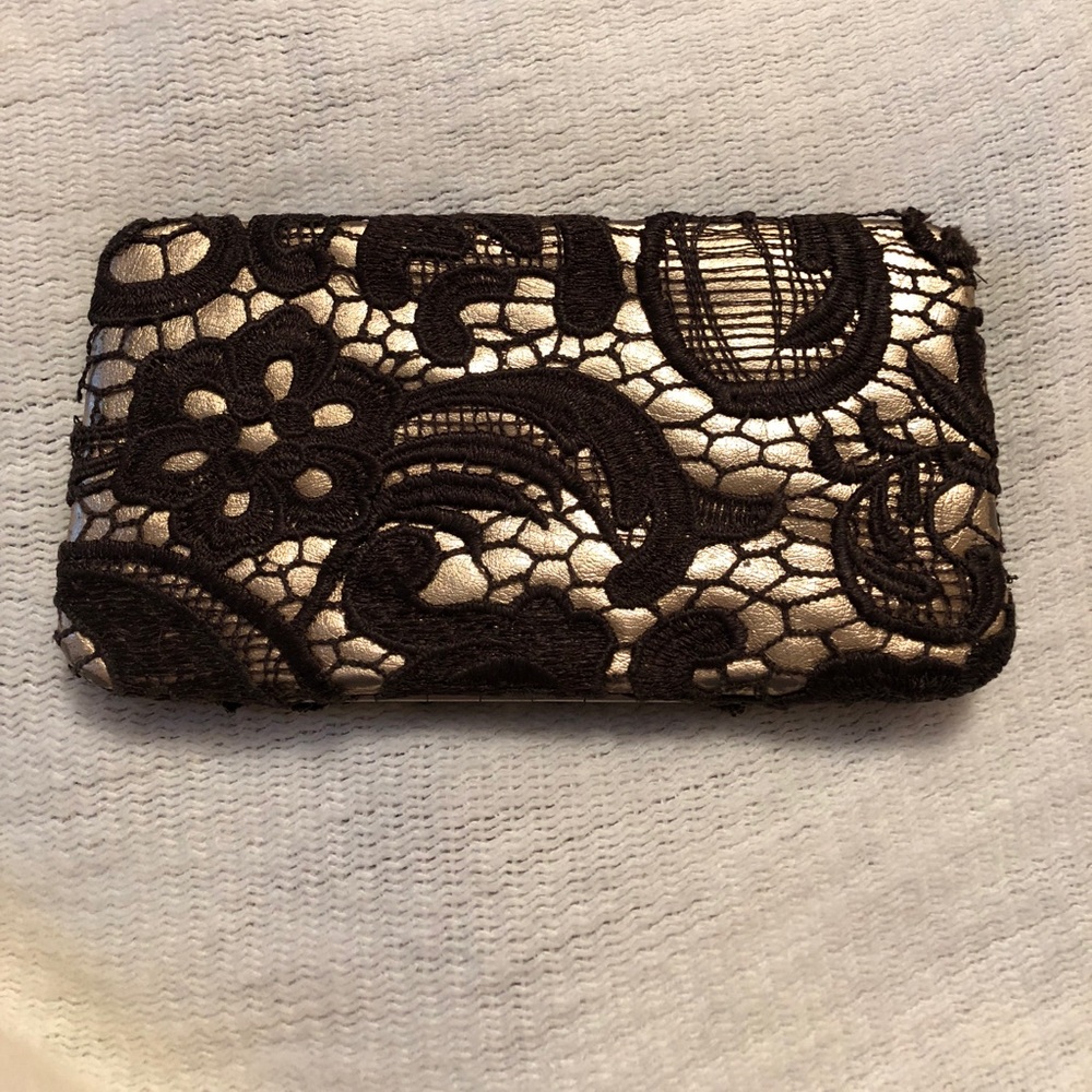 Gold wallet with lace covered design