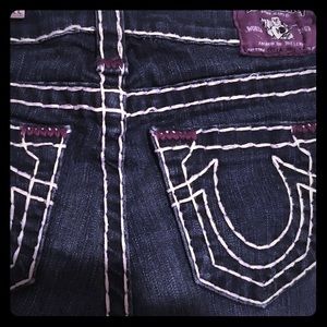 True Religion white stitch jeans.