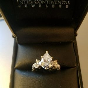 2 carat teardrop diamond with white gold band