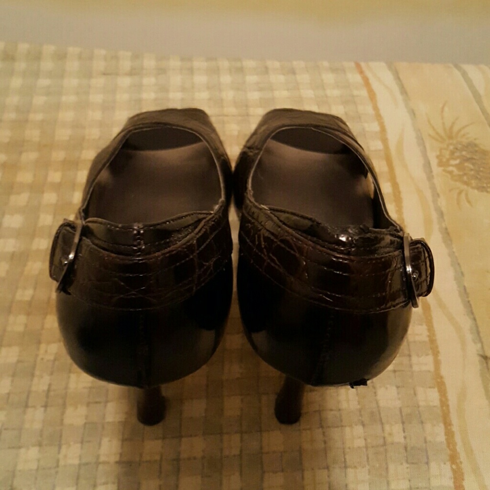 Brown open toed pumps