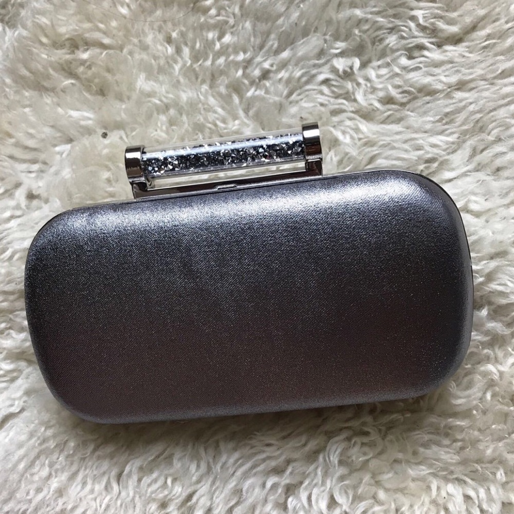 LA REGALE EVENING CLUTCH. NEVER WORN OUT. NWT