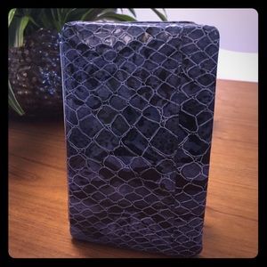 L. Erickson faux python Opera Wallet