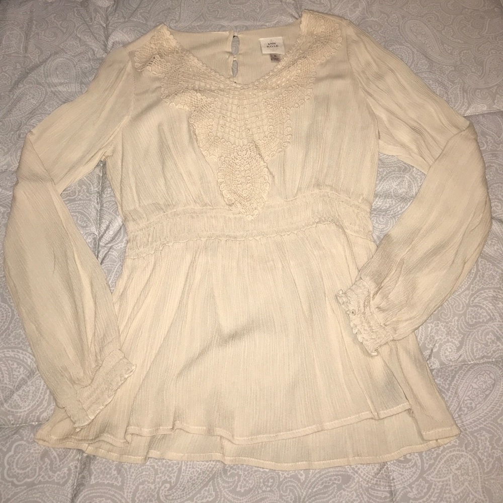 Cream blouse with cute design!