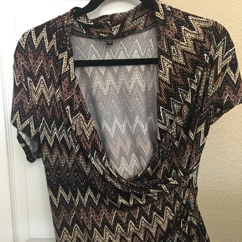 Brown & black patterned stretchy wrap blouse.