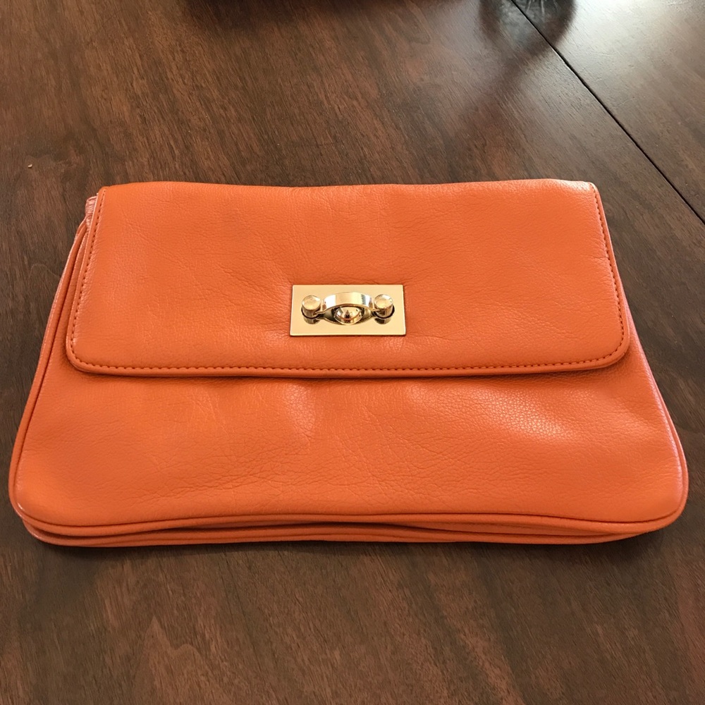 Orange clutch with gold chain & details