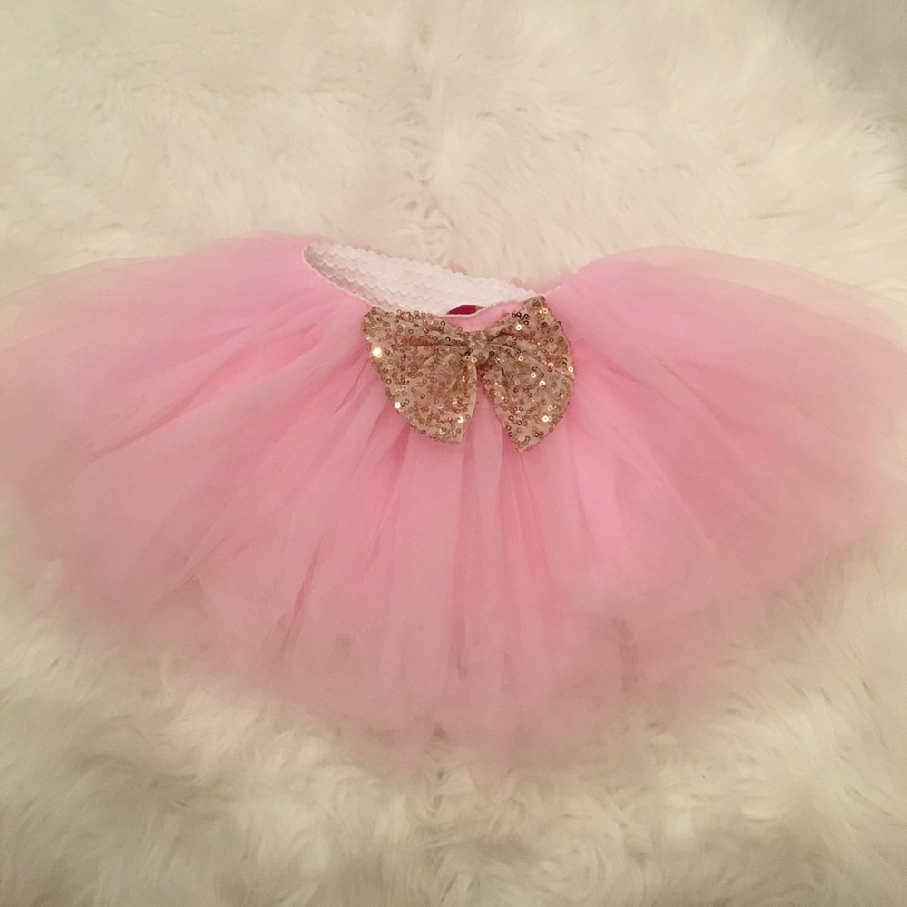 Light pink tutu with gold bow