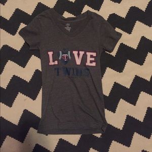 A love twins baseball team shirt.