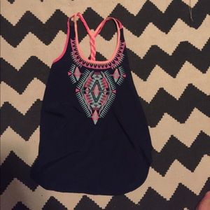 A navy blue tank top with cute patterns.