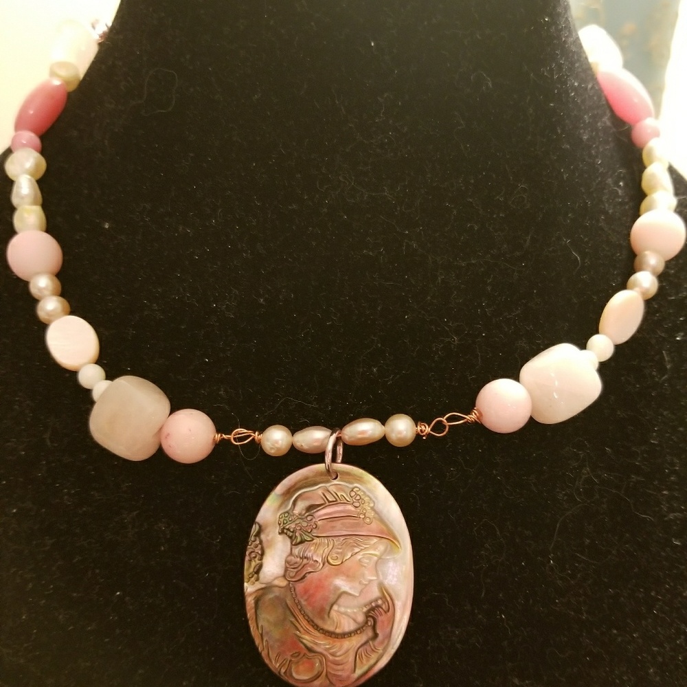 Pink necklace with mother of pearl cameo