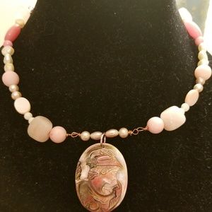 Pink necklace with mother of pearl cameo