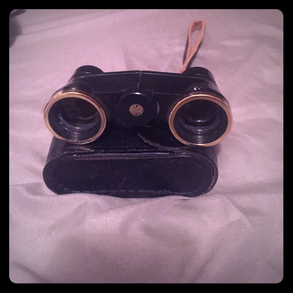 Black & white antique binoculars with leather case