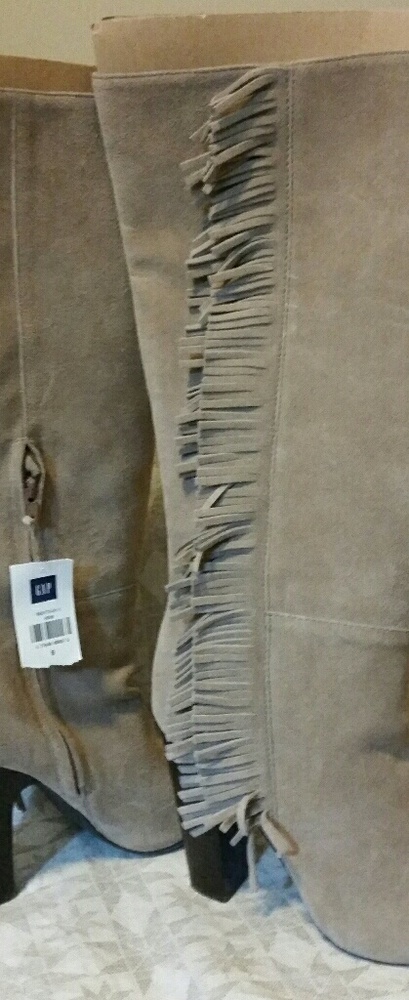 Brand new, fringe and suede shit kickers.