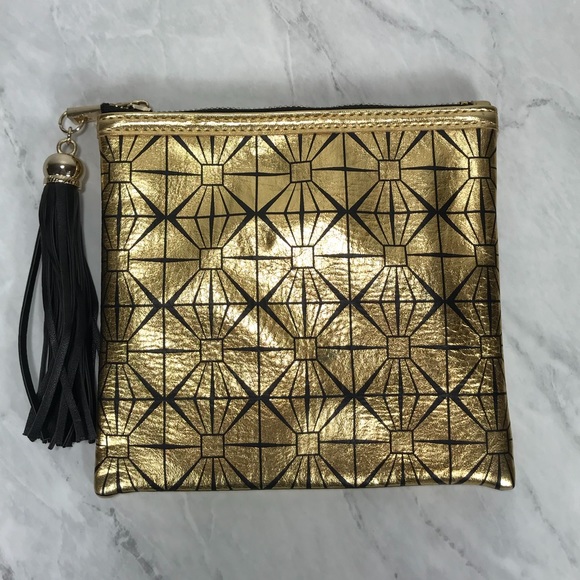bebe Handbags - ❌SOLD❌ Bebe Gold And Black Tassle Pouch