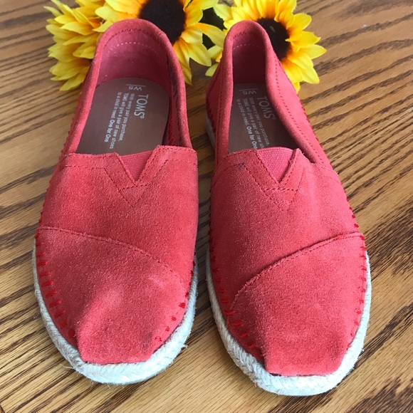 Toms Shoes - Toms red slip on shoes. Size 5