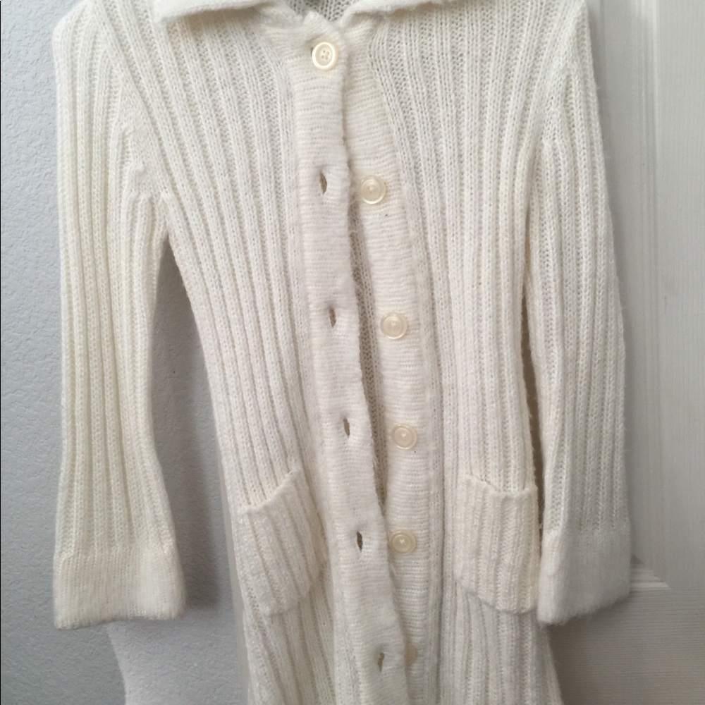 Knitted long sweater