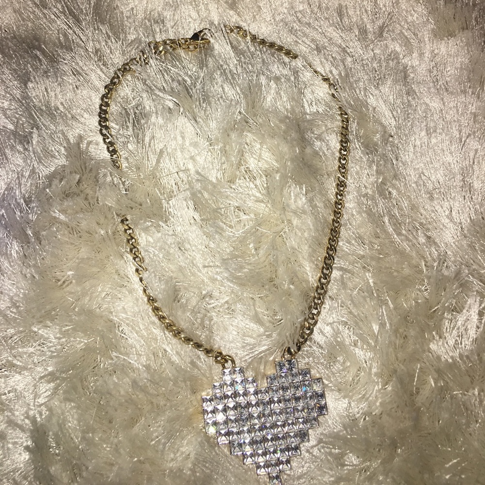 Juicy Couture heart necklace.