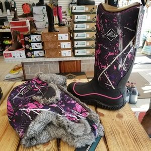 Muck boots with mad bomber hat