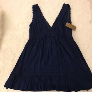 Never worn navy blue flows dress!