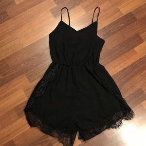 Sexy little black lace romper