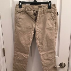AE tan skinny pants