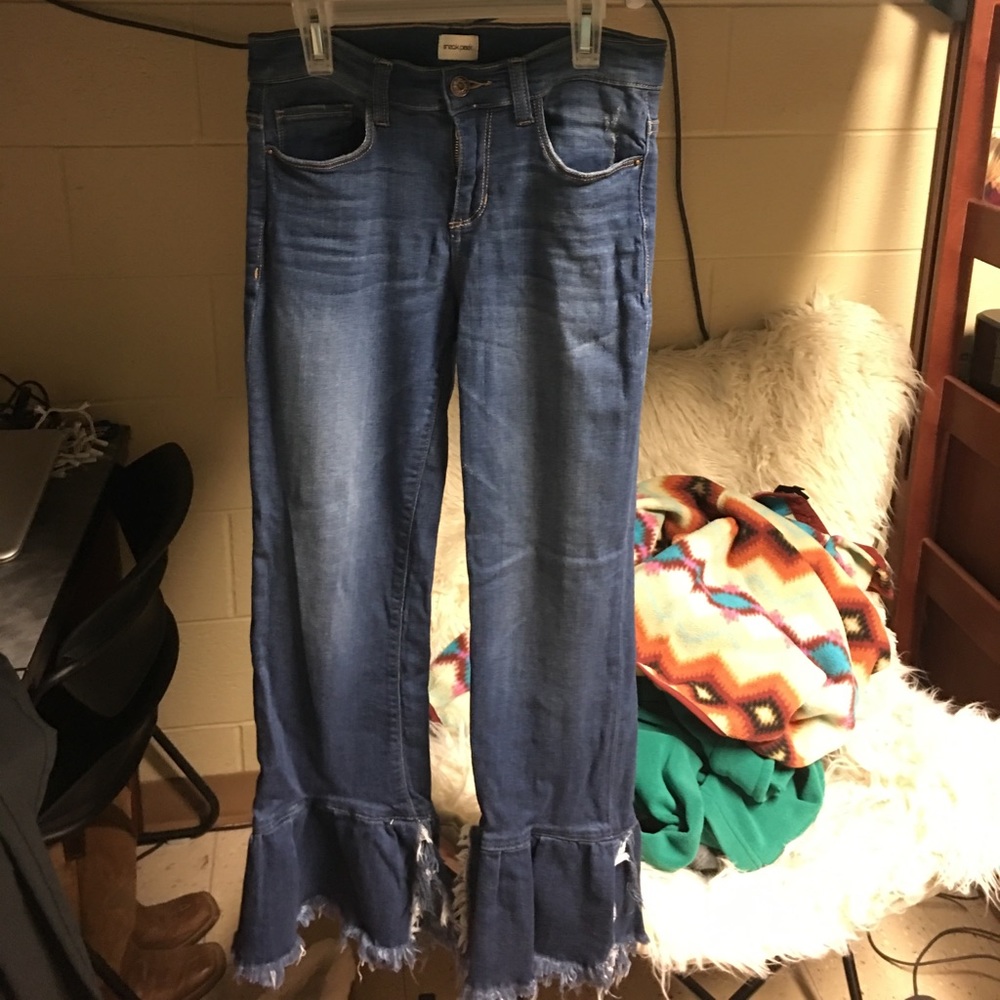 Sneak peek frayed flare jeans