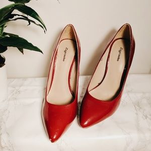 Red pointed toe heels