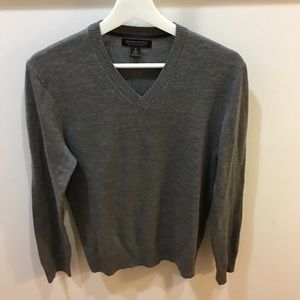 Gray V-neck sweater