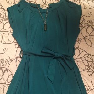 Emerald green dress with sash